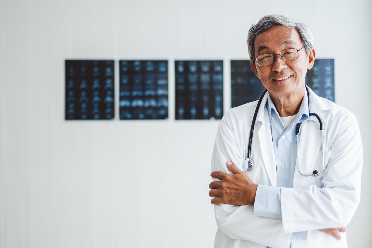 neurologist infront of nero-radiology reports